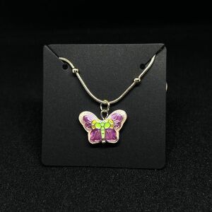 Gold and Pink butterfly pendant necklace brand new. For woman. Or teen gift